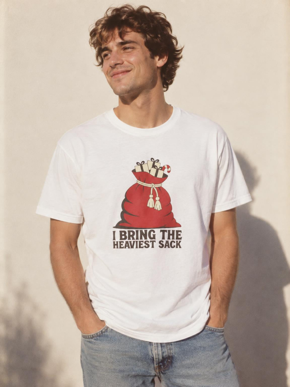 Funny Christmas Sack Gag Gift Secret Santa T-Shirt in White – worn by a man