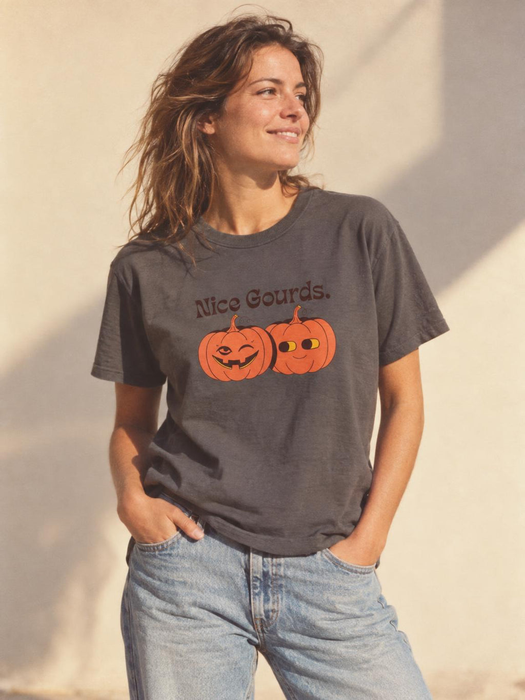 Nice Gourds Funny Pumpkin Fall Halloween T-Shirt in Charcoal – worn by a woman
