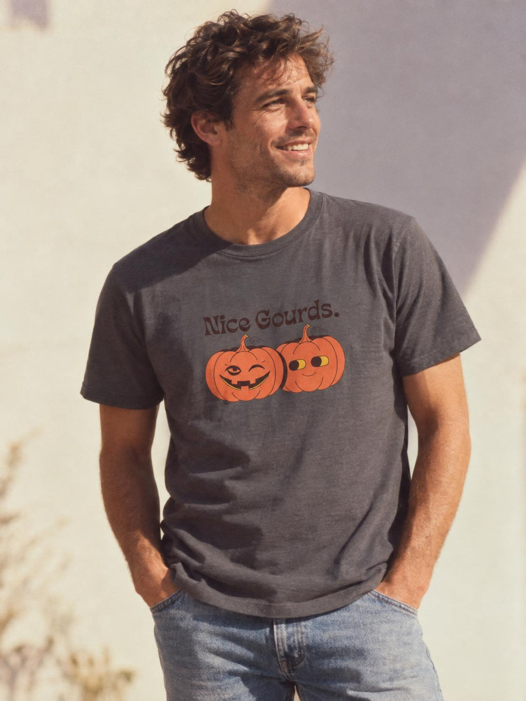 Nice Gourds Funny Pumpkin Fall Halloween T-Shirt in Charcoal – worn by a man