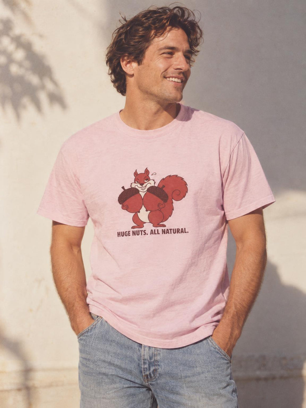 Squirrel Huge Nuts All Natural Funny Fall Innuendo T-Shirt in Light Pink – worn by a man