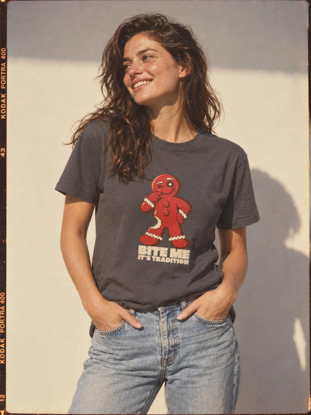 Bite Me It's Tradition Funny Gingerbread Christmas T-Shirt in Charcoal – worn by a woman