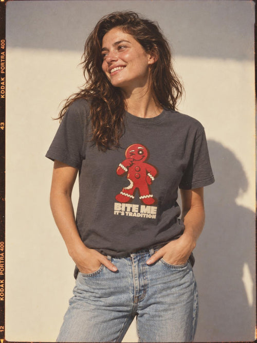 Bite Me It's Tradition Funny Gingerbread Christmas T-Shirt in Charcoal – worn by a woman