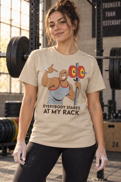 Everybody Stares At My Rack Funny Gym Squat Rack T-Shirt in Sand – worn by a woman