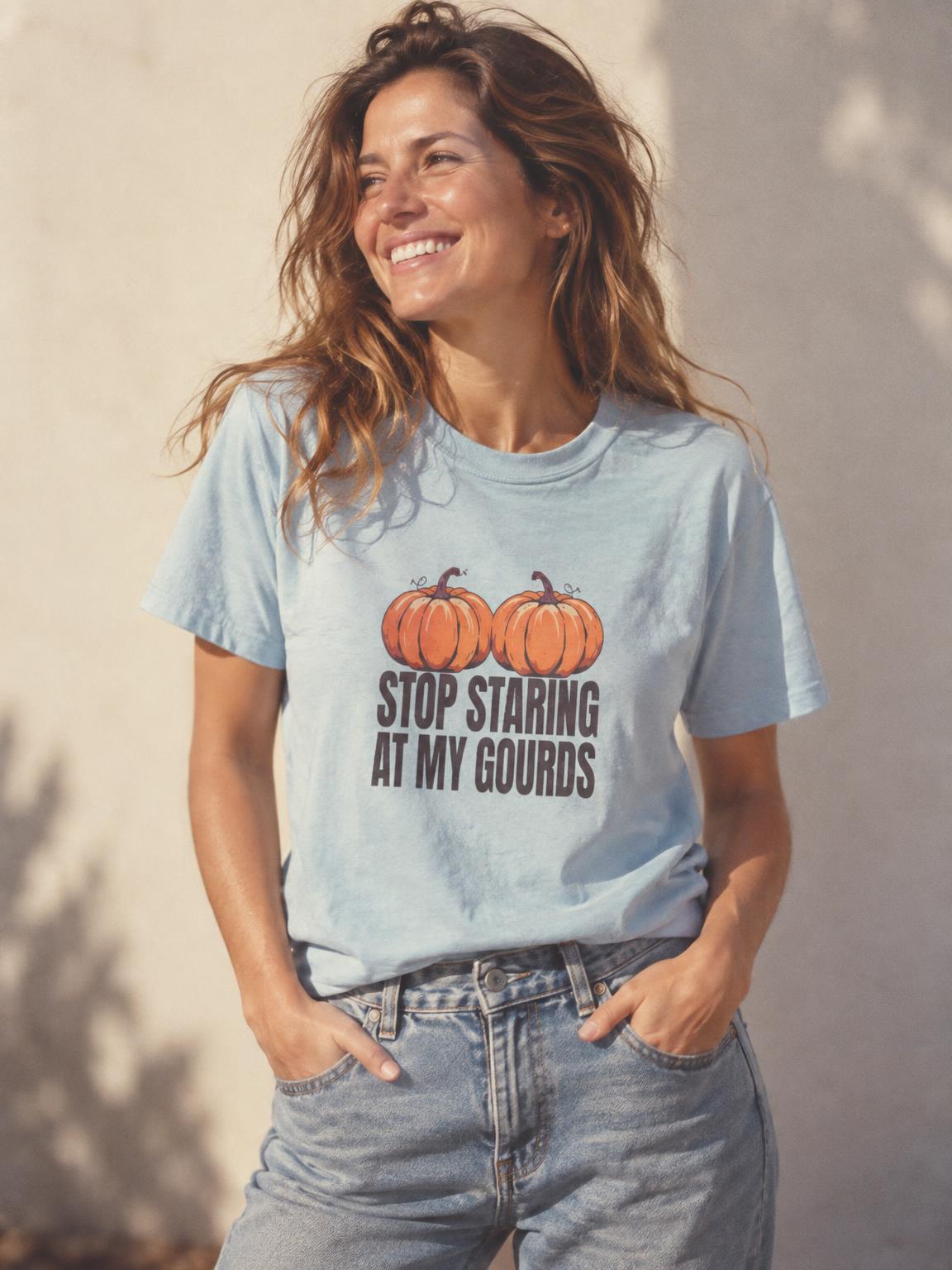 Stop Staring At My Gourds Funny Halloween Pumpkin T-Shirt in Light Blue – worn by a woman