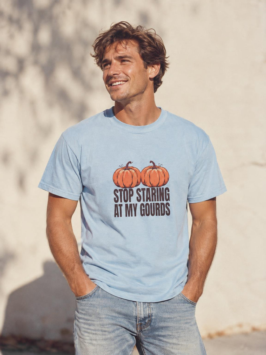 Stop Staring At My Gourds Funny Halloween Pumpkin T-Shirt in Light Blue – worn by a man
