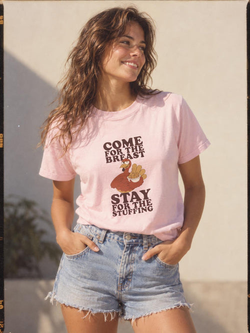 Friendsgiving Turkey Stuffing Funny Thanksgiving Dinner T-Shirt in Light Pink – worn by a woman