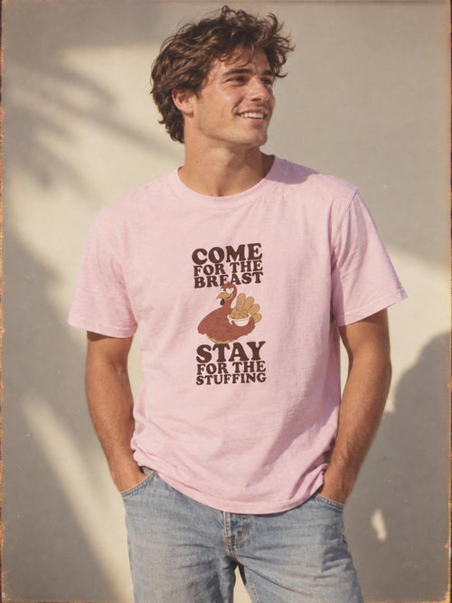 Friendsgiving Turkey Stuffing Funny Thanksgiving Dinner T-Shirt in Light Pink – worn by a man